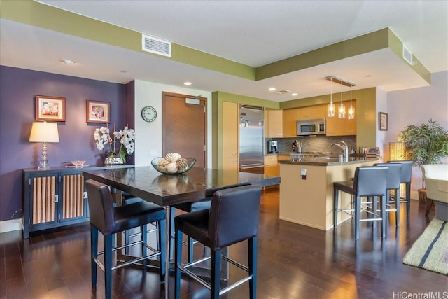 1837 Kalakaua Ave Unit 808, Honolulu, HI 96815 - dining area featuring dark wood-style flooring and recessed lighting