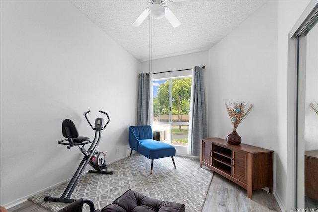 91-1145 Laaulu St Unit 12B, Ewa Beach, HI 96706 - sitting room with a textured ceiling, ceiling fan, and wood finished floors