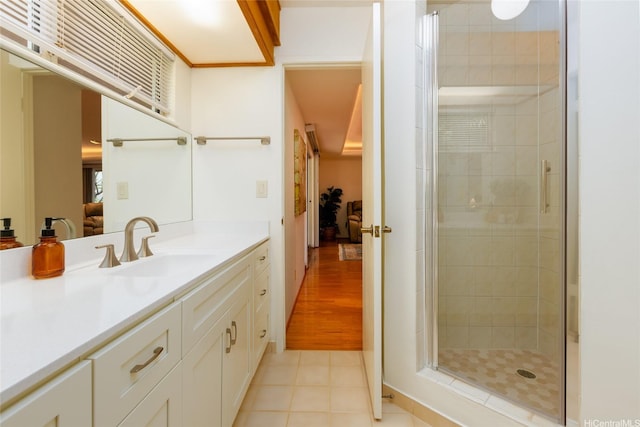 92-1318 Hauone St, Kapolei, HI 96707 - ensuite bathroom with vanity, a stall shower, and tile patterned flooring