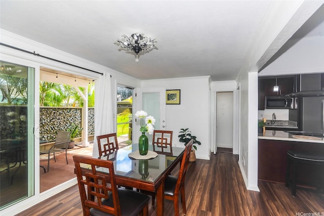 94-559 Makohilani St Unit 1071, Mililani, HI 96789 - dining area featuring dark wood finished floors and ornamental molding