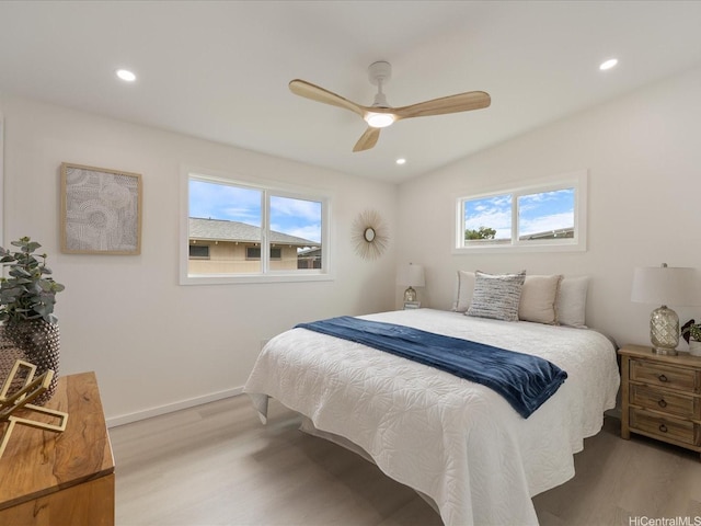 2078 Akaikai Loop, Pearl City, HI 96782 - bedroom with light wood finished floors, multiple windows, recessed lighting, and a ceiling fan