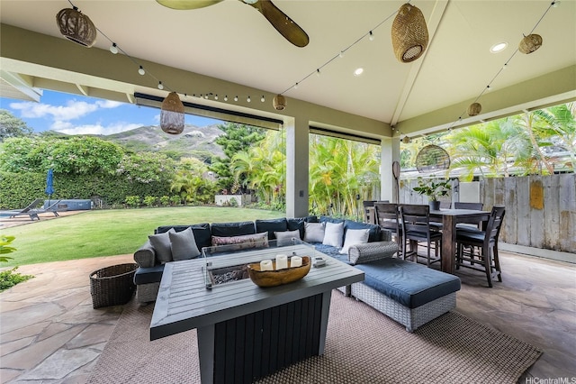 1319 Mokulua Dr, Kailua, HI 96734 - view of patio featuring a ceiling fan, outdoor dining area, an outdoor hangout area, and a mountain view