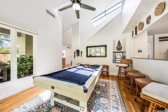 1319 Mokulua Dr, Kailua, HI 96734 - rec room with a towering ceiling, a ceiling fan, wood finished floors, a skylight, and pool table