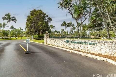 57-101 Kuilima Dr Unit 168, Kahuku, HI 96731 - view of asphalt road with curbs