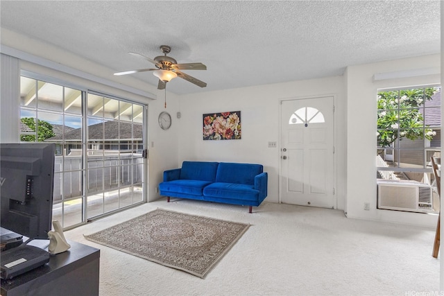 94-1359 Kulewa Loop Unit 16S, Waipahu, HI 96797 - carpeted living room with ceiling fan, a textured ceiling, and cooling unit