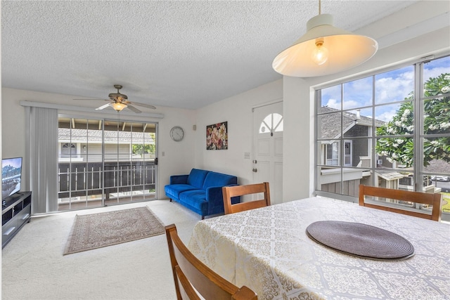 94-1359 Kulewa Loop Unit 16S, Waipahu, HI 96797 - dining space with a textured ceiling, carpet floors, and a ceiling fan