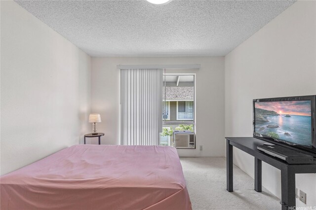 94-1359 Kulewa Loop Unit 16S, Waipahu, HI 96797 - bedroom with carpet flooring, a textured ceiling, and cooling unit