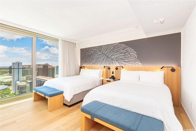 1390 Kapiolani Blvd Unit 3808, Honolulu, HI 96814 - bedroom featuring wood finished floors and multiple windows