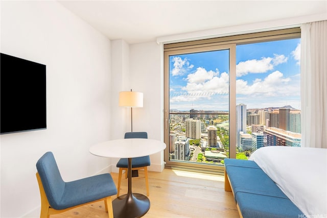 1390 Kapiolani Blvd Unit 3808, Honolulu, HI 96814 - sitting room featuring light wood-type flooring and a view of city