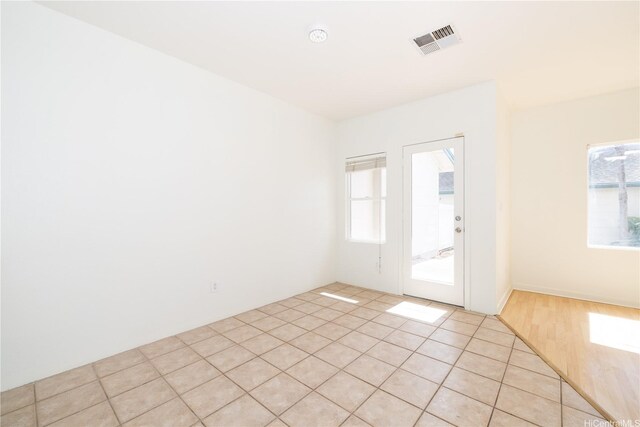 91-1051 Keoneula Blvd Unit E2, Ewa Beach, HI 96706 - empty room with light tile patterned floors