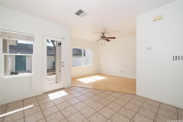 91-1051 Keoneula Blvd Unit E2, Ewa Beach, HI 96706 - unfurnished room with light tile patterned flooring and a ceiling fan