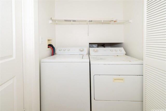 91-1051 Keoneula Blvd Unit E2, Ewa Beach, HI 96706 - laundry room with separate washer and dryer