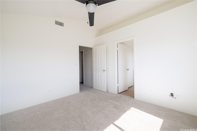 91-1051 Keoneula Blvd Unit E2, Ewa Beach, HI 96706 - unfurnished bedroom featuring light colored carpet and a ceiling fan