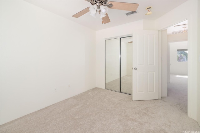 91-1051 Keoneula Blvd Unit E2, Ewa Beach, HI 96706 - unfurnished bedroom featuring carpet flooring, a closet, and ceiling fan
