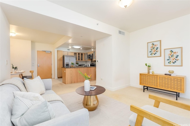 600 Queen St Unit 2103, Honolulu, HI 96813 - living area featuring light colored carpet and baseboards