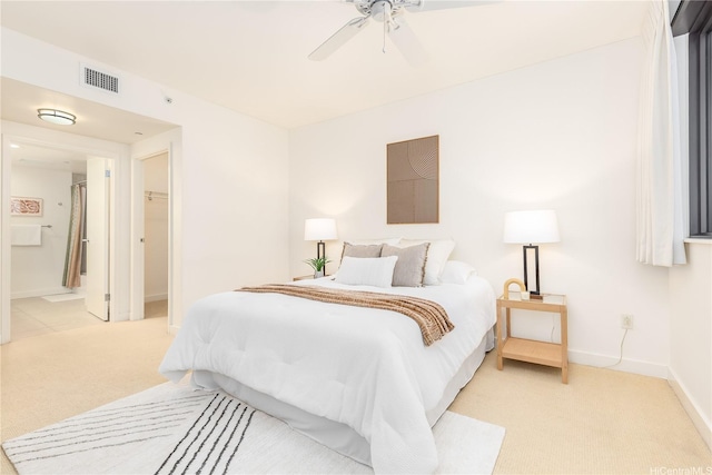600 Queen St Unit 2103, Honolulu, HI 96813 - bedroom with light carpet, connected bathroom, and ceiling fan