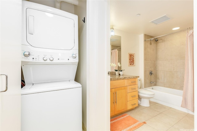 600 Queen St Unit 2103, Honolulu, HI 96813 - laundry room with stacked washer / drying machine and light tile patterned floors