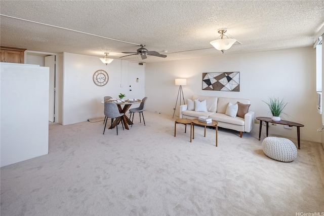 98-288 Kaonohi St Unit 3901, Aiea, HI 96701 - carpeted living area featuring a ceiling fan and a textured ceiling