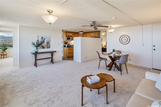98-288 Kaonohi St Unit 3901, Aiea, HI 96701 - living area with light carpet and a ceiling fan