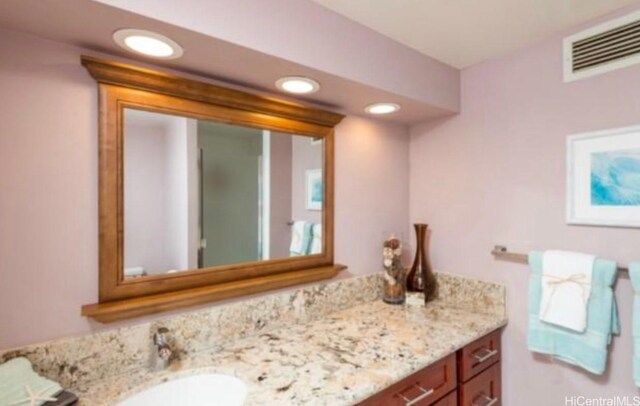 2333 Kapiolani Blvd Unit 2707, Honolulu, HI 96826 - bathroom with vanity and recessed lighting
