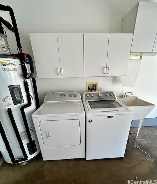 91-280 Makalea St Unit 23, Ewa Beach, HI 96706 - washroom with electric water heater, separate washer and dryer, and cabinet space