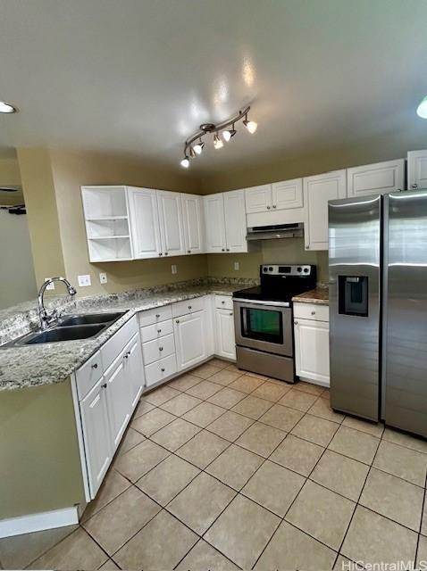 91-280 Makalea St Unit 23, Ewa Beach, HI 96706 - kitchen with appliances with stainless steel finishes, under cabinet range hood, light tile patterned flooring, open shelves, and white cabinets