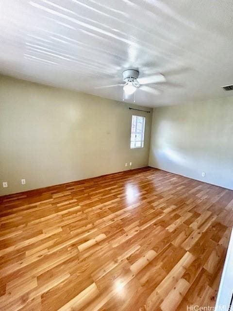 91-280 Makalea St Unit 23, Ewa Beach, HI 96706 - empty room featuring light wood finished floors and a ceiling fan