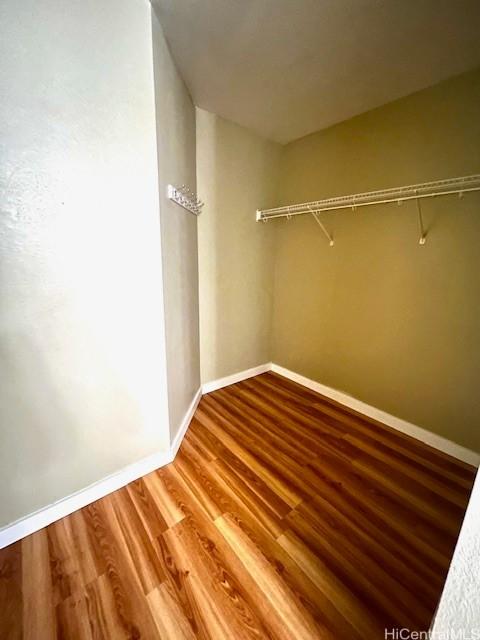 91-280 Makalea St Unit 23, Ewa Beach, HI 96706 - walk in closet featuring wood finished floors