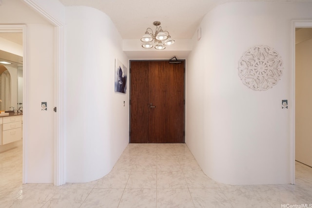 425 S St Unit 2401, Honolulu, HI 96813 - corridor featuring a chandelier