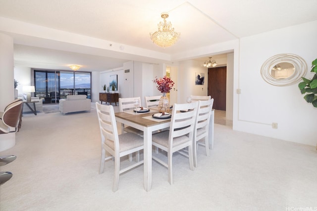 425 S St Unit 2401, Honolulu, HI 96813 - dining space with a chandelier and light carpet