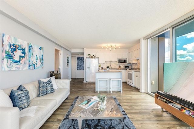 801 S St Unit 3822, Honolulu, HI 96813 - living area with light wood-type flooring and a textured ceiling
