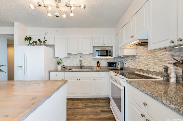 801 S St Unit 3822, Honolulu, HI 96813 - kitchen with white appliances, under cabinet range hood, dark wood finished floors, a textured ceiling, and white cabinets