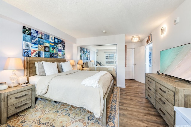 801 S St Unit 3822, Honolulu, HI 96813 - bedroom with wood finished floors and a closet