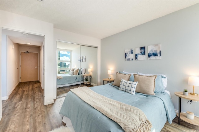 801 S St Unit 3822, Honolulu, HI 96813 - bedroom with wood finished floors and a closet