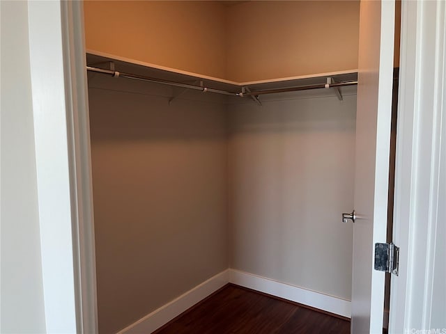1837 Kalakaua Ave Unit 1103, Honolulu, HI 96815 - walk in closet featuring dark wood-type flooring
