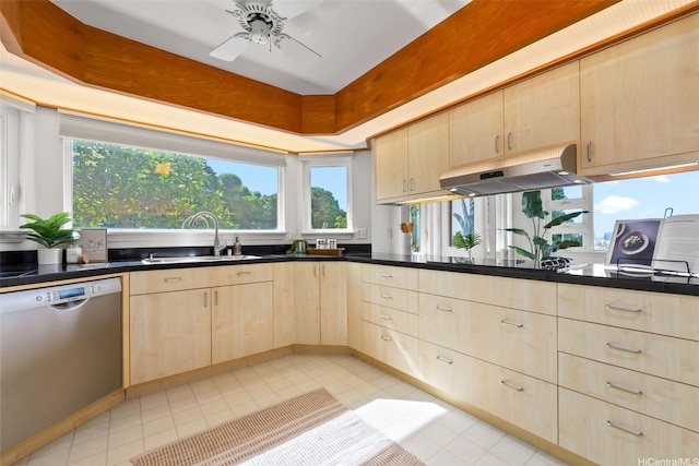 2117 Aulii St, Honolulu, HI 96817 - kitchen with stainless steel dishwasher, light brown cabinetry, under cabinet range hood, and light tile patterned floors