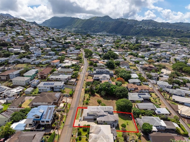 2117 Aulii St, Honolulu, HI 96817 - aerial perspective of suburban area with property boundaries highlighted and a mountain backdrop