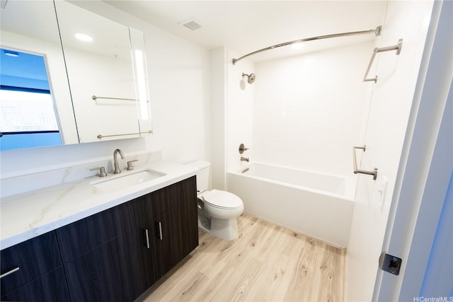 615 Keawe St Unit 3207, Honolulu, HI 96813 - bathroom featuring wood finished floors, vanity, and tub / shower combination