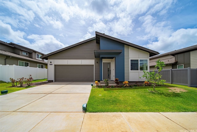91-1775 Kohanahana Loop, Ewa Beach, HI 96706 - mid-century modern home with a garage and driveway