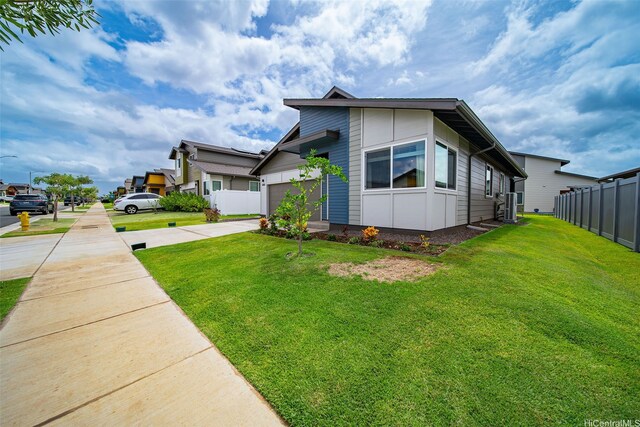 91-1775 Kohanahana Loop, Ewa Beach, HI 96706 - view of home's exterior with driveway and a garage