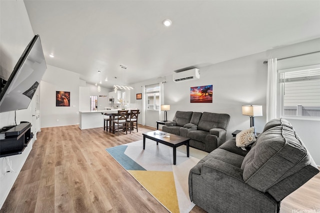 91-1775 Kohanahana Loop, Ewa Beach, HI 96706 - living room with a wall unit AC, light wood-style floors, and recessed lighting
