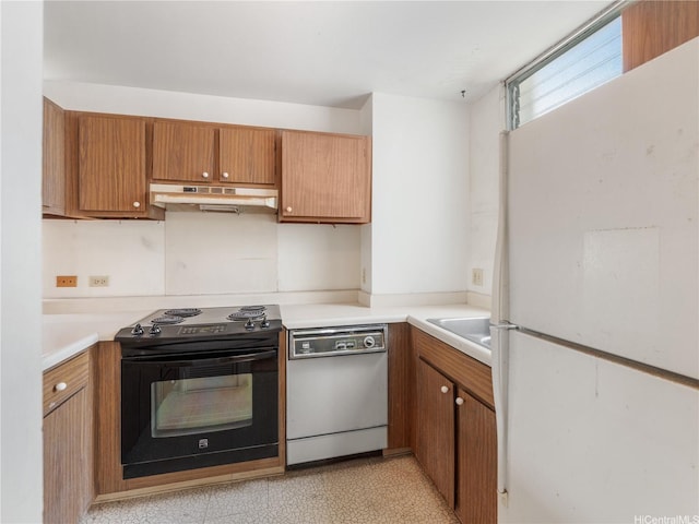 1160 Ala Napunani St Unit 1407, Honolulu, HI 96818 - kitchen with white appliances, under cabinet range hood, brown cabinetry, light countertops, and light floors