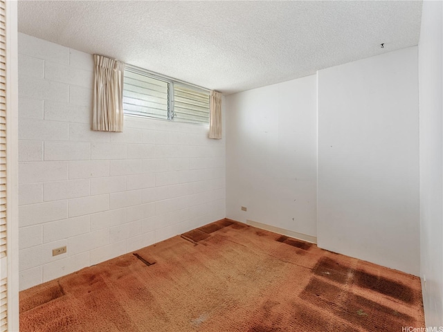 1160 Ala Napunani St Unit 1407, Honolulu, HI 96818 - carpeted empty room featuring a textured ceiling