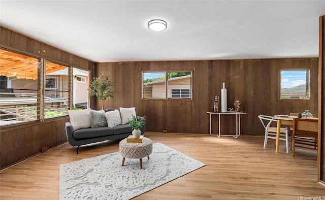 1915 Lohilani St Unit B, Honolulu, HI 96819 - living room featuring wooden walls and light wood-style floors