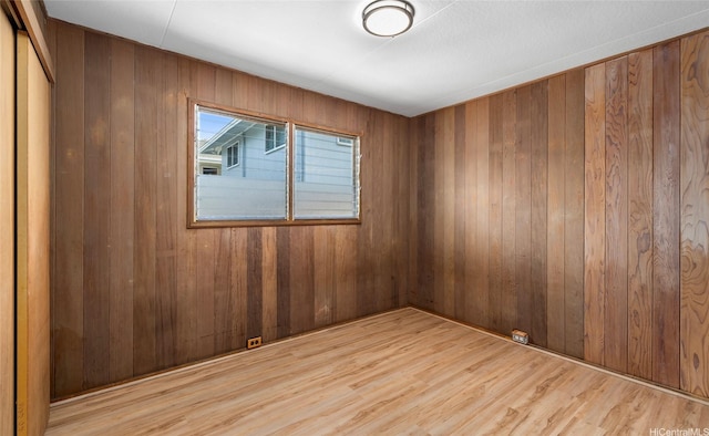 1915 Lohilani St Unit B, Honolulu, HI 96819 - spare room featuring wood walls and wood finished floors