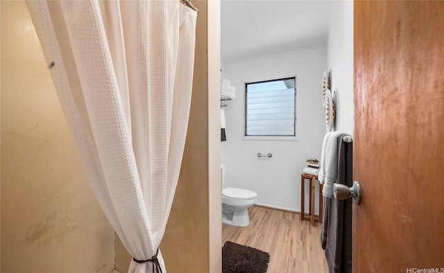 1915 Lohilani St Unit B, Honolulu, HI 96819 - bathroom with wood finished floors and curtained shower