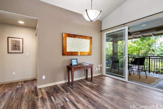 75-6025 Alii Dr Unit L201, Kailua Kona, HI 96740 - dining room featuring wood finished floors and vaulted ceiling