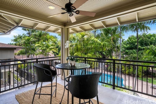 75-6025 Alii Dr Unit L201, Kailua Kona, HI 96740 - balcony featuring a ceiling fan and view of pool