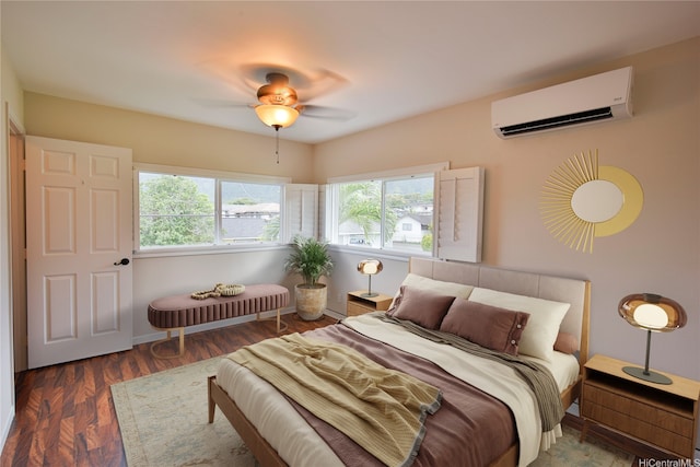 45-521 Halekou Rd Unit B, Kaneohe, HI 96744 - bedroom featuring a wall unit AC, wood finished floors, and ceiling fan