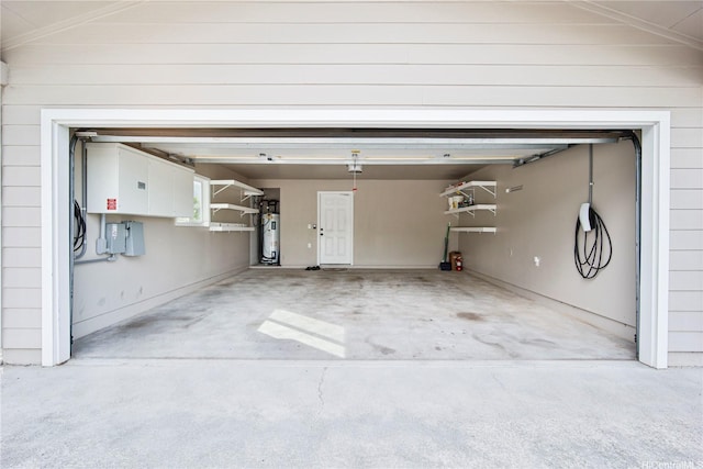 45-521 Halekou Rd Unit B, Kaneohe, HI 96744 - garage featuring driveway and water heater